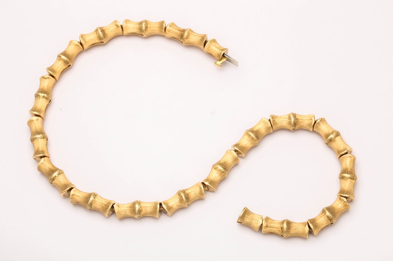 18kt Yellow Gold Segmented Bamboo Necklace.  Great weight - approximately 90 grams.  Very supple & rich.  Back to the 60's with a fine brushed finish